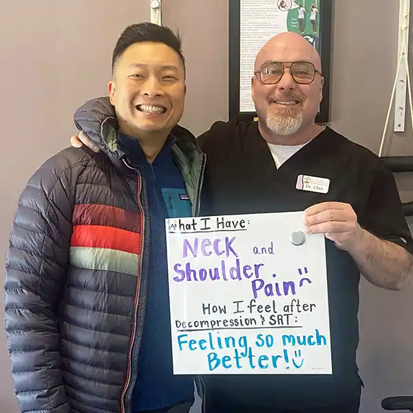 A patient with Dr. Chris after neck and shoulder pain relief
